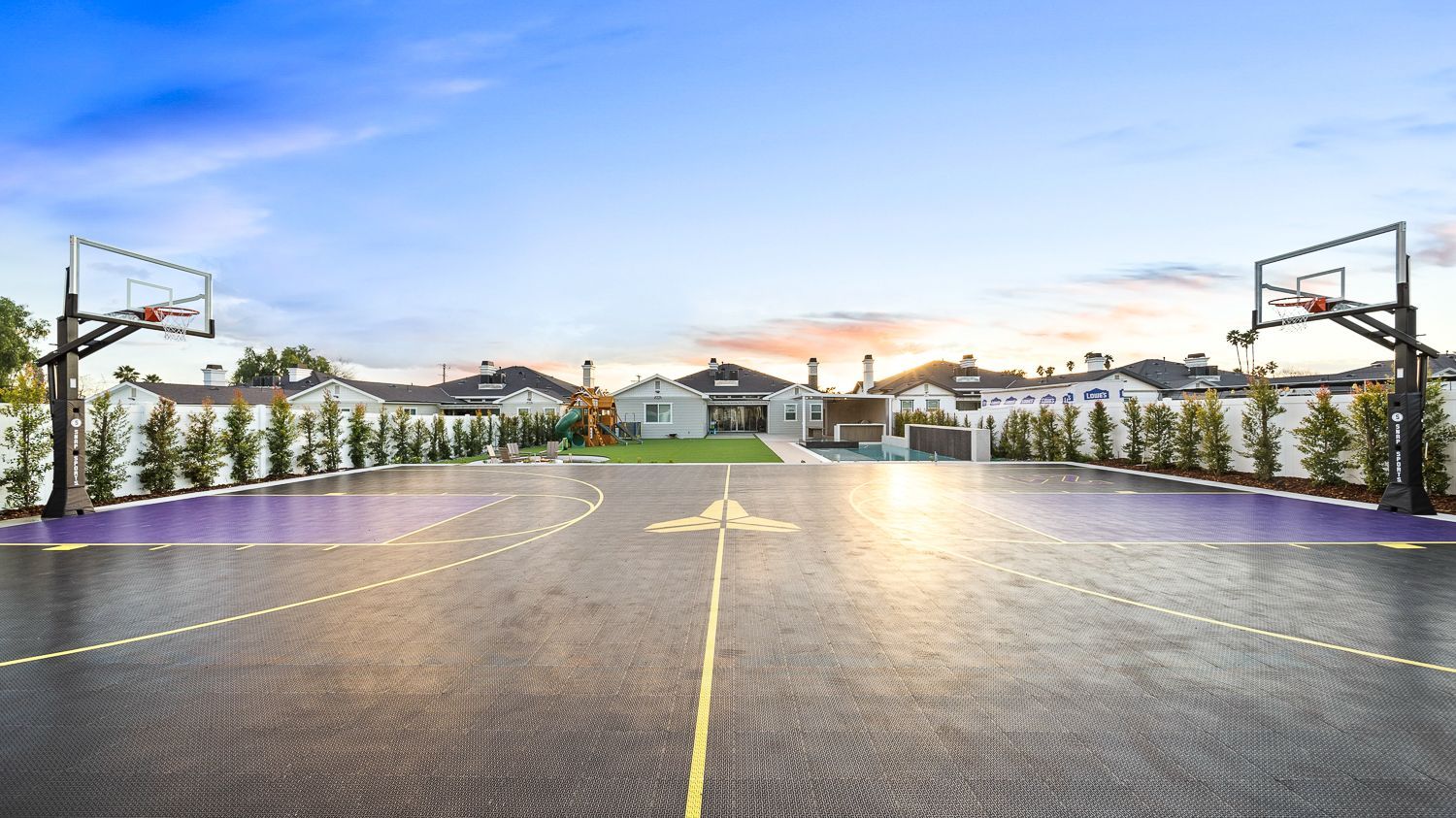 Custom pool and outdoor living project complete with a full court basketball court and outdoor kitchen. Project by Westmod. Location = Santa Clarita, CA.