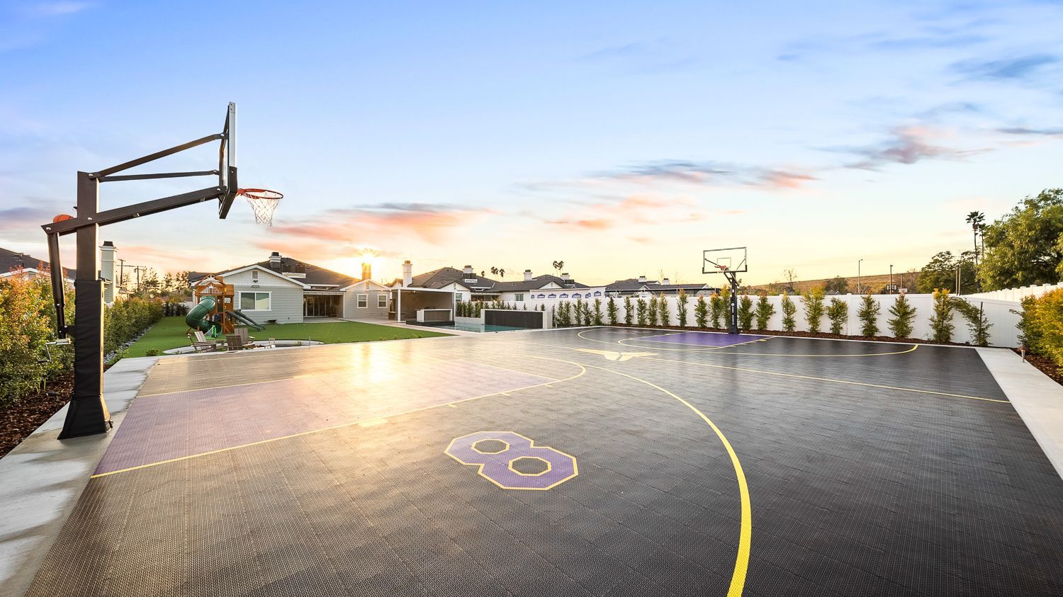 Custom pool and outdoor living project complete with a full court basketball court and outdoor kitchen. Project by Westmod. Location = Santa Clarita, CA.