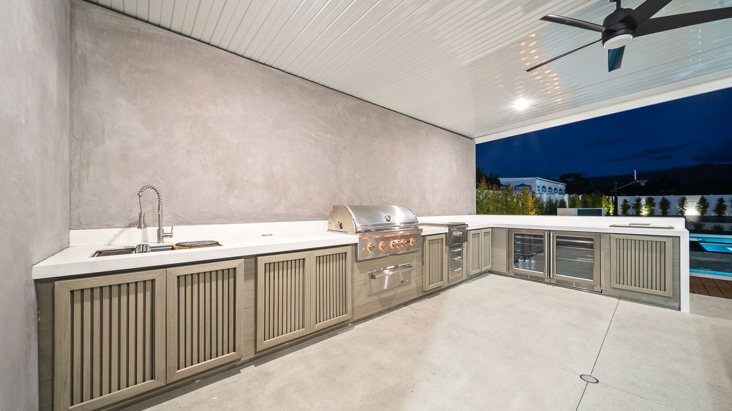 Custom pool and outdoor living project complete with a full court basketball court and outdoor kitchen. Project by Westmod. Location = Santa Clarita, CA.