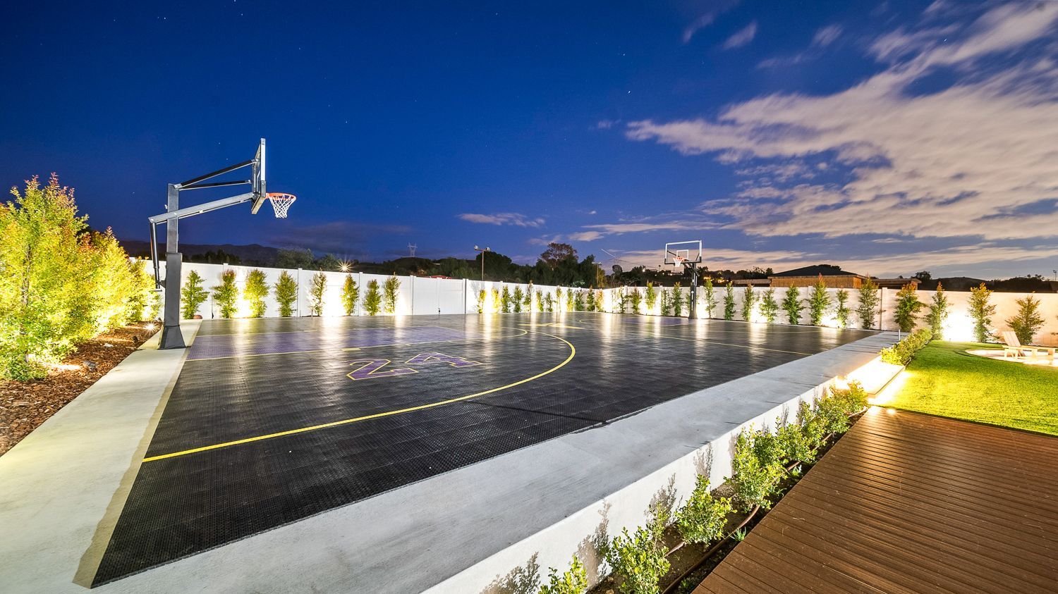 Custom pool and outdoor living project complete with a full court basketball court and outdoor kitchen. Project by Westmod. Location = Santa Clarita, CA.