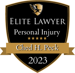 Elite Lawyer award for Ched H. Peck, Personal Injury, 2023. Black and gold shield with winged symbol.