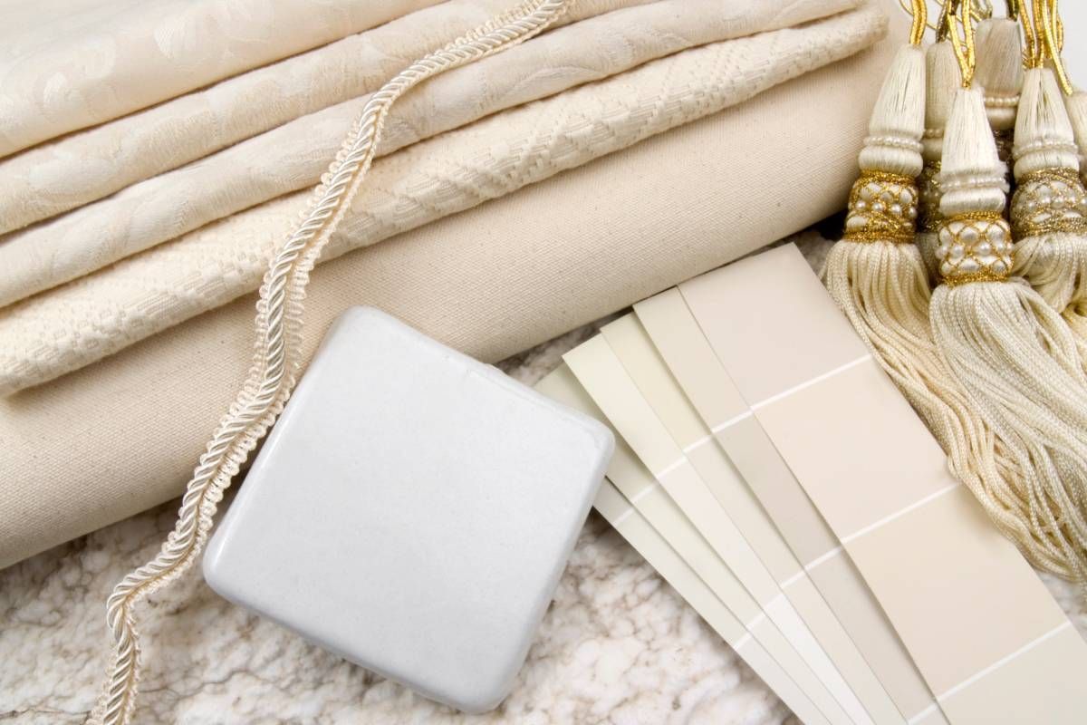 Creamy neutral fabric swatches and paint chips at Your Style Window Treatments & Decor near Fort Myers, Florida