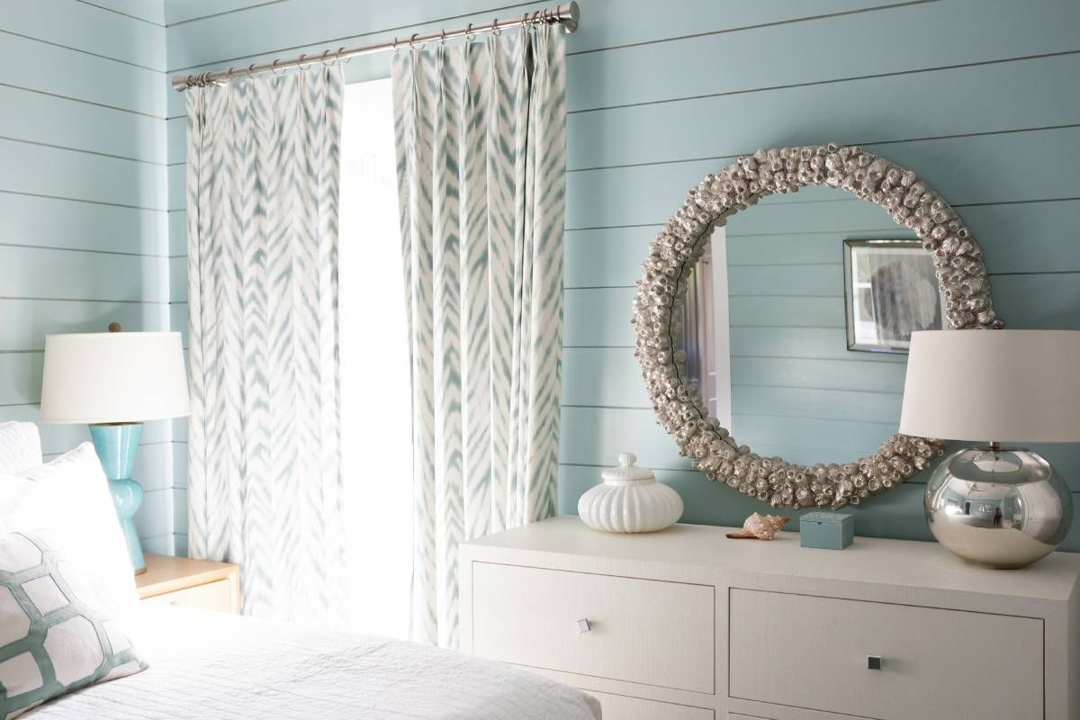 Light beachy bedroom with teal walls at Your Style Window Treatments & Decor near Fort Myers, Florida