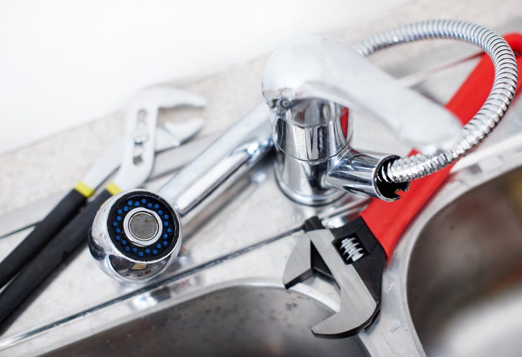 Adjustable Wrench And Faucets