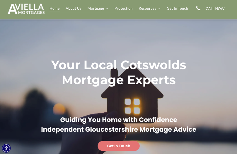 Website banner: Cotswolds mortgage experts. Hand holding house silhouette with glowing window.