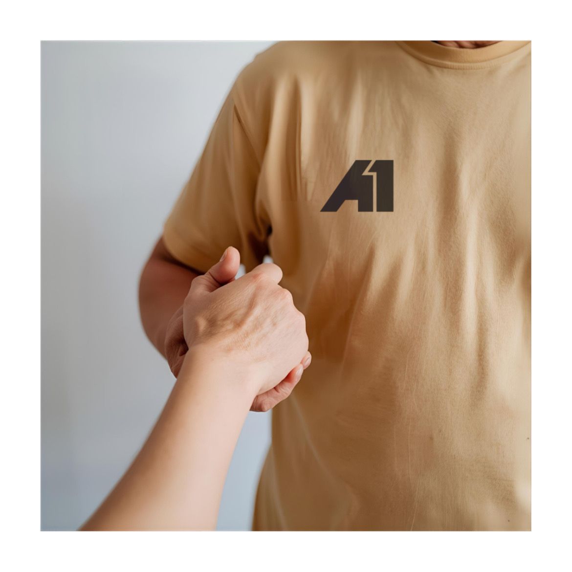 Person in tan shirt with 