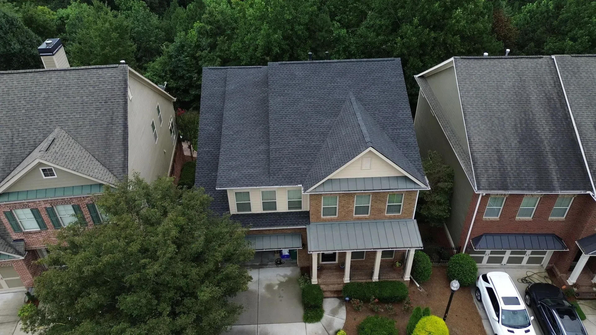 An aerial view of a row of houses in a residential area.