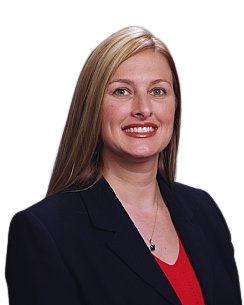 A woman in a black jacket and red shirt smiles for the camera