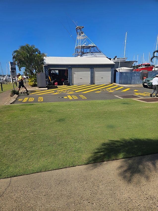 A Building with a Parking Lot — Chops Painting in Coral Cove, QLD