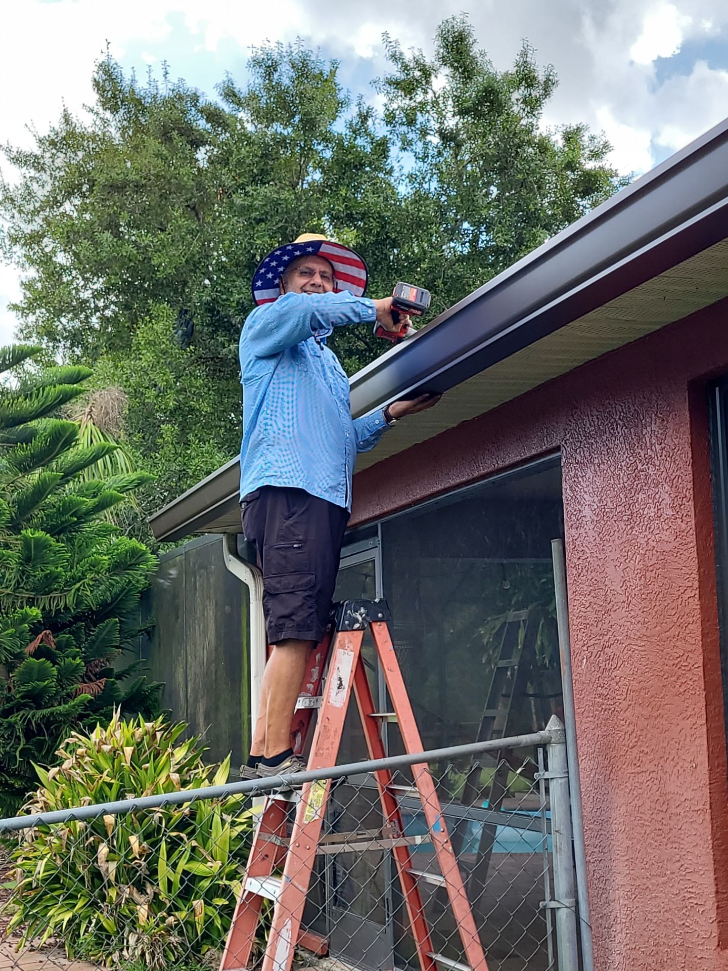 Heads Up Roofing founder installing 7inch K-Style Gutters in Florida.  #1 Gutter Install