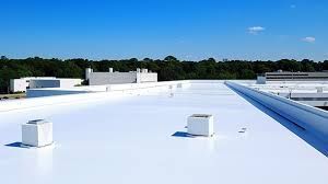 A white roof with a blue sky in the background.