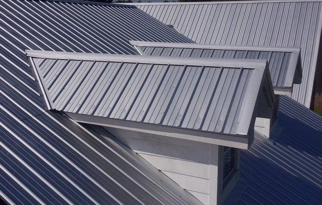 A close up of a metal roof on a house