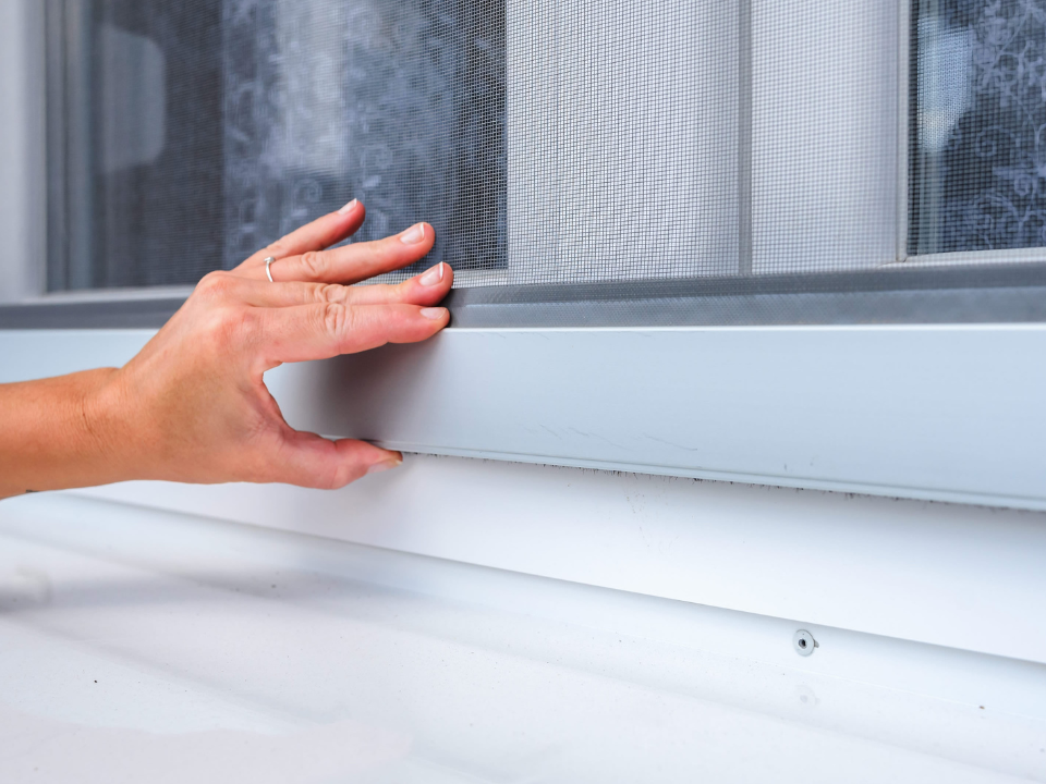 hand opening window screen that was installed by Corona Screen Repair