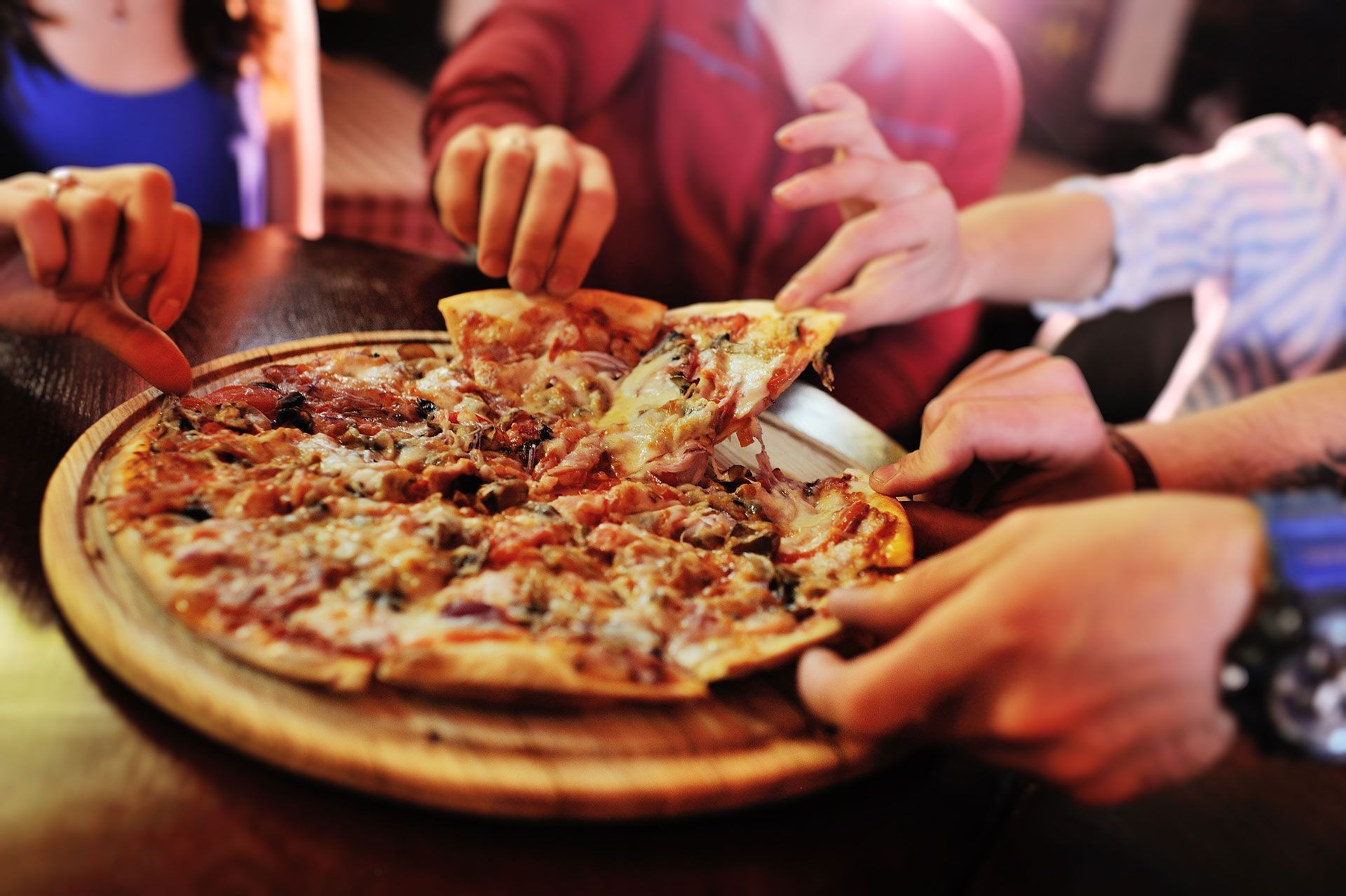 Group Eating Pizza