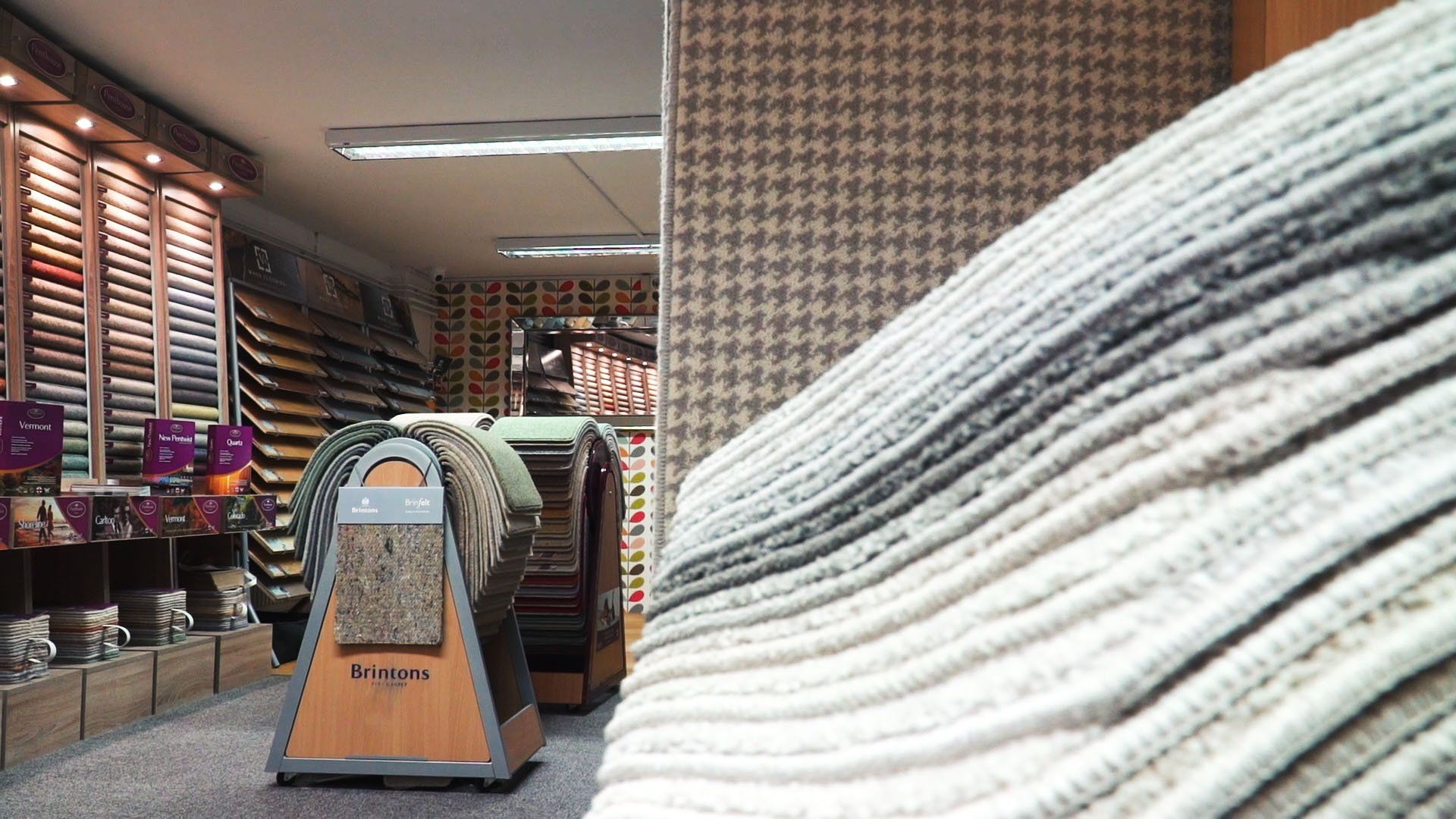 selection of carpet options inside a showroom