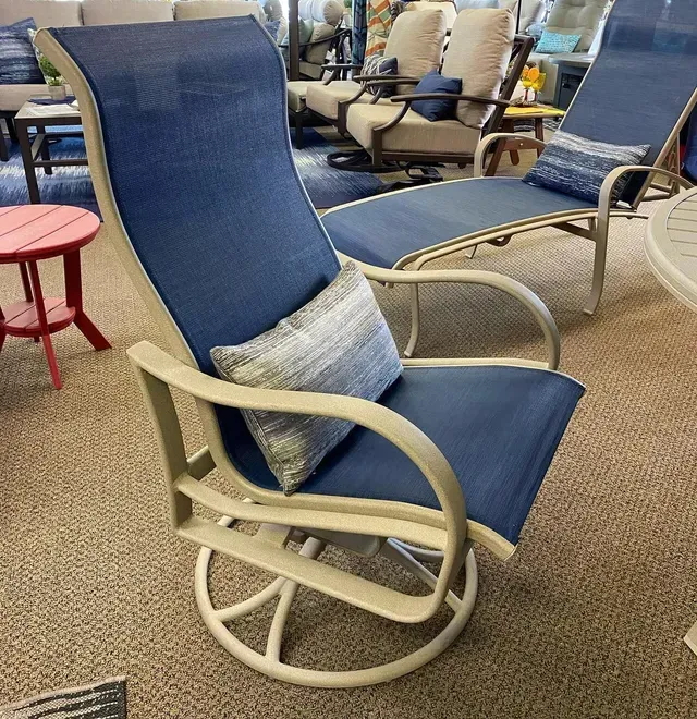 White Chair with A Pillow on It