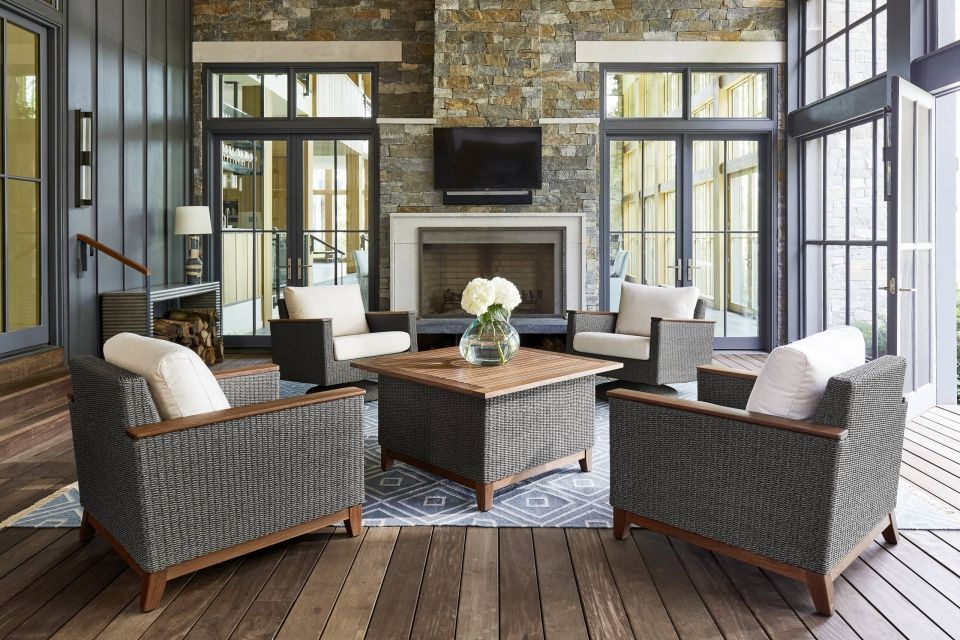 A living room filled with furniture and a fireplace.