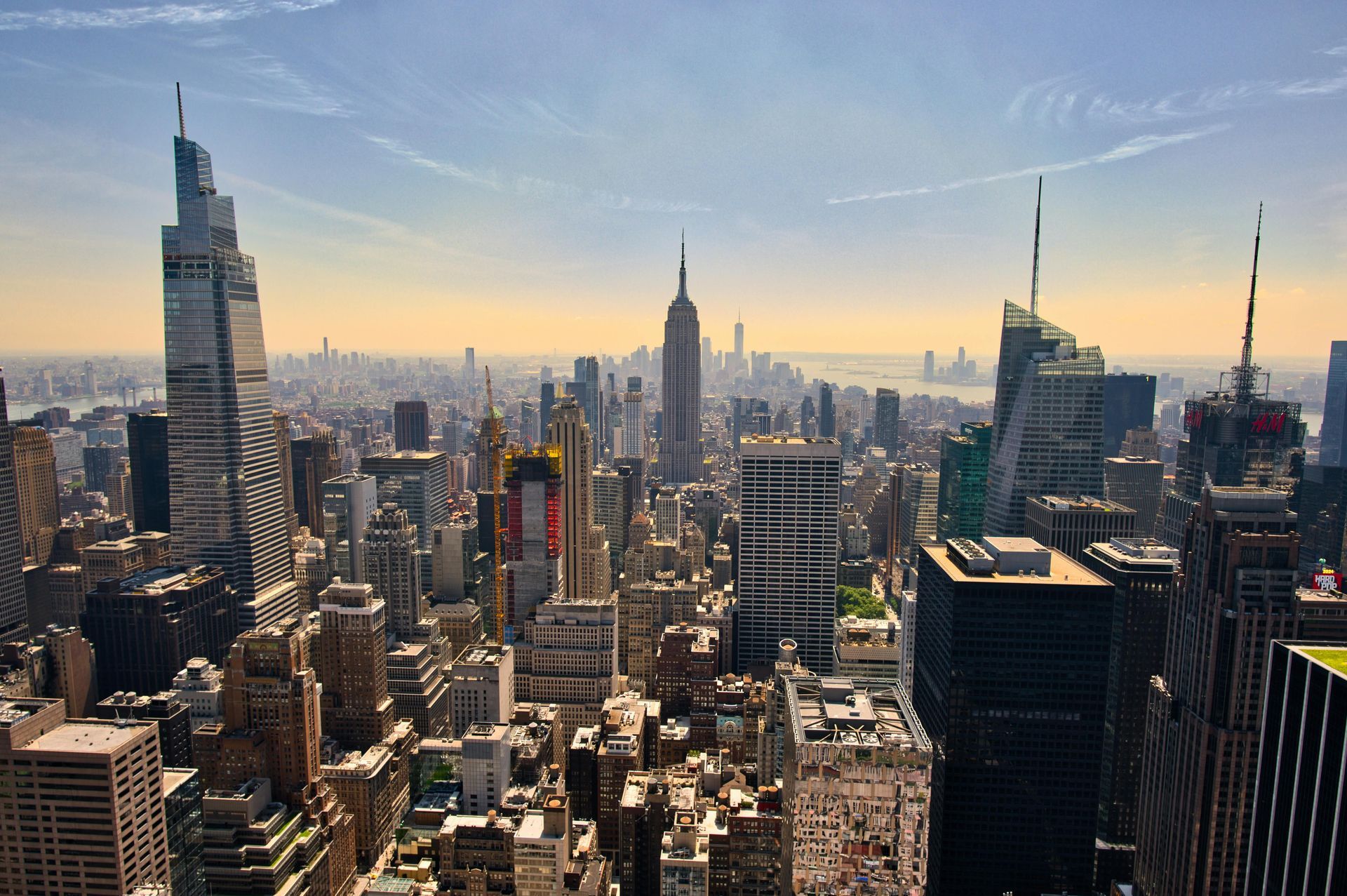 Sunset skyline of Manhattan with the Empire State Building and surrounding skyscrapers