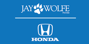 Jay Wolfe Honda logo in white on a blue background with Honda emblem below
