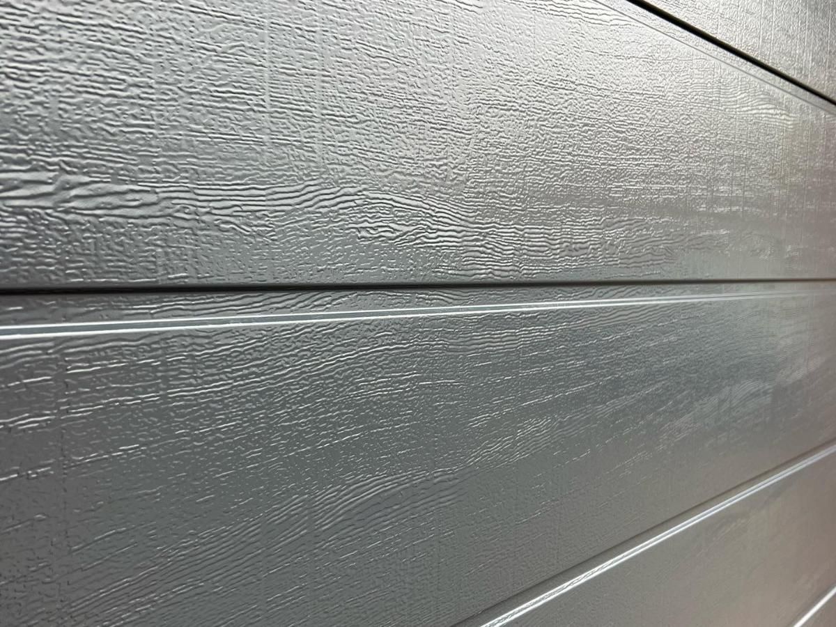 Spray Maestro close-up after garage door spraying to show the level of finish that can be achieved.