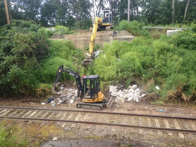 Demolishing Bridge Foundation — Cranesville, PA — Brandon C. Kennedy Construction & Excavating