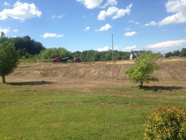 Field Installing Ponds — Cranesville, PA — Brandon C. Kennedy Construction & Excavating