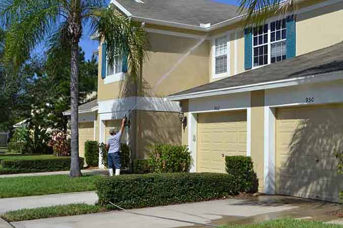 Commercial during the washing services — Commercial Roof Pressure Washing Services in Tampa Bay, FL