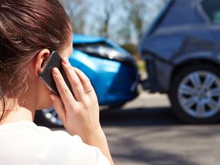 Female Driver Making Phone Call - Collision Repair in Oneonta, NY