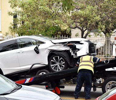 Loading Wreck Car — Towing Services in Tablelands, QLD