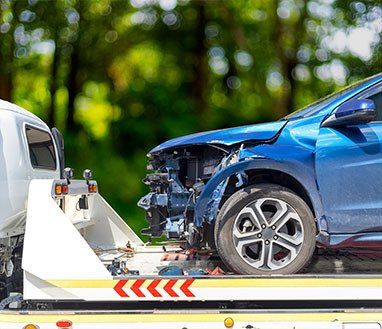 Blue Car Have Damage by Accident on Road — Towing in Innisfail, QLD