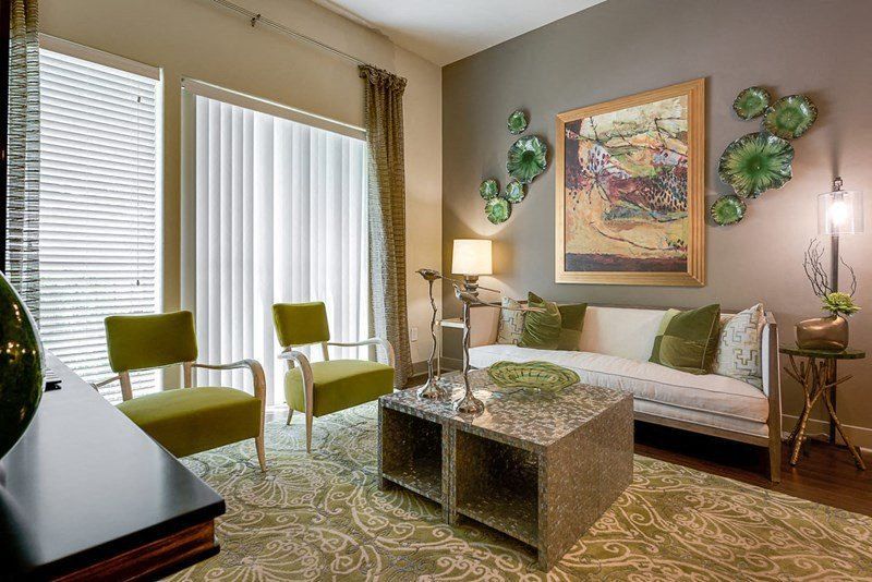a living room with a couch and a table
