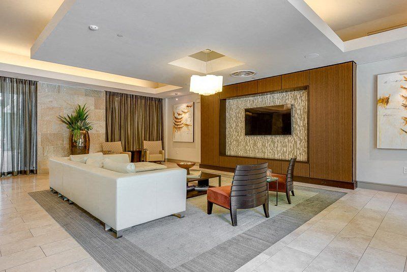 a living room with a couch and a table
