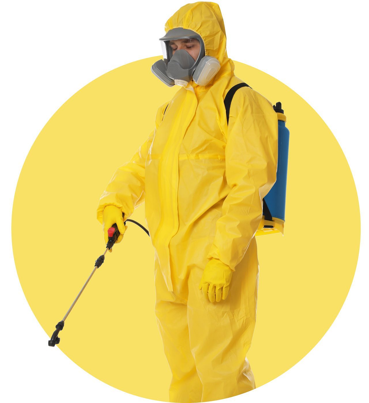 A man in a yellow protective suit is spraying something with a sprayer.