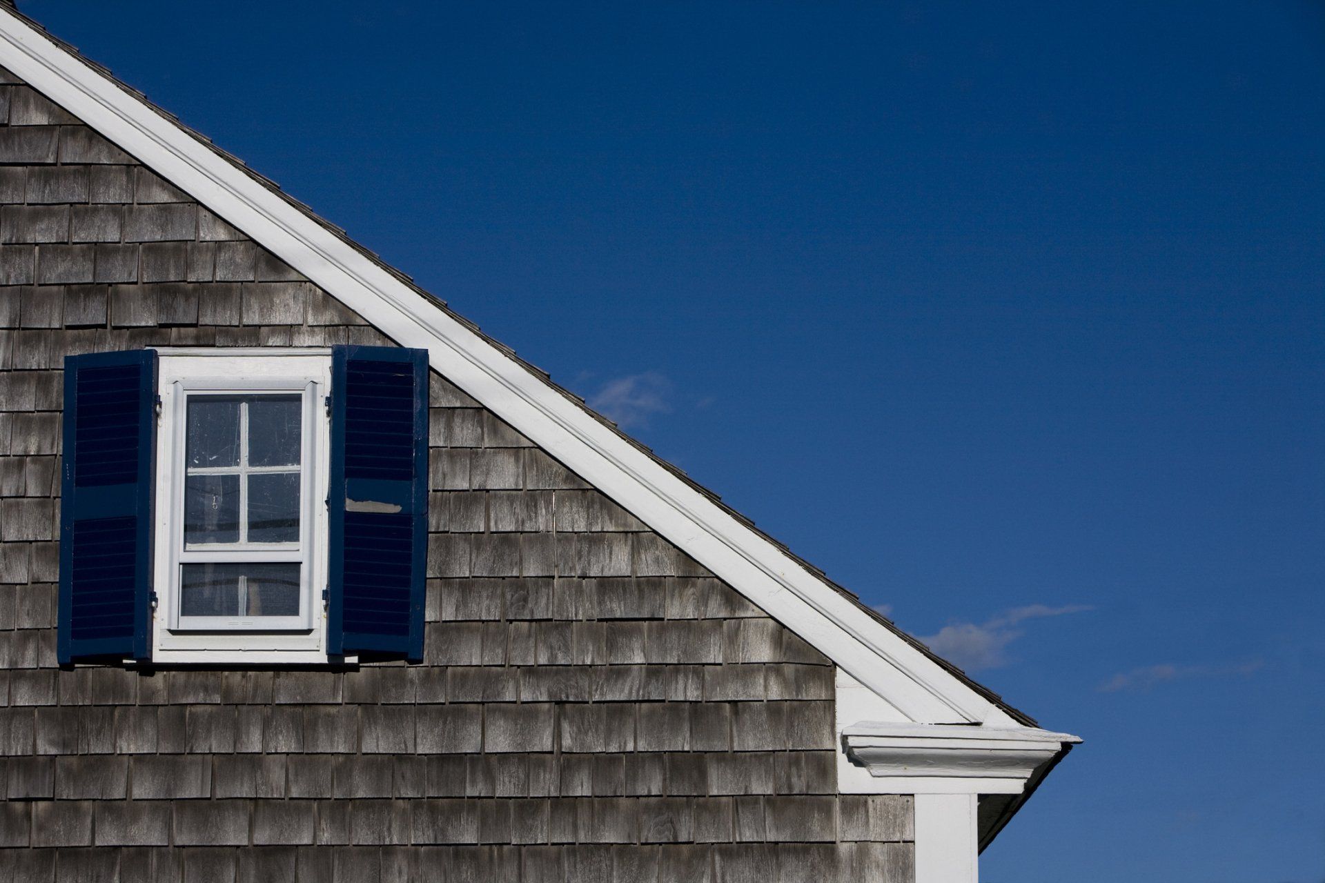 House With Blue Shutters - Hyannis, MA - Cape Cod Pro Builders and Remodeling