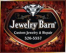 Logo for Jewelry Barn, elegant jewelry boutique with custom designs, repairs, and appraisals.