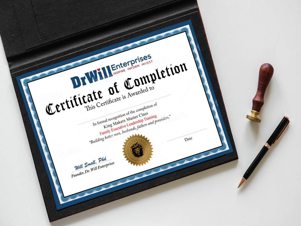 A certificate of completion is sitting on a table next to a pen.
