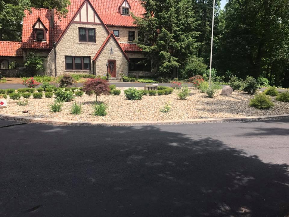 Road In Front Of Red Roofed House | East Peoria, IL | Pete George & Son Blacktop