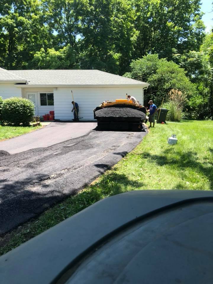 A Truck Spreading Concrete | East Peoria, IL | Pete George & Son Blacktop