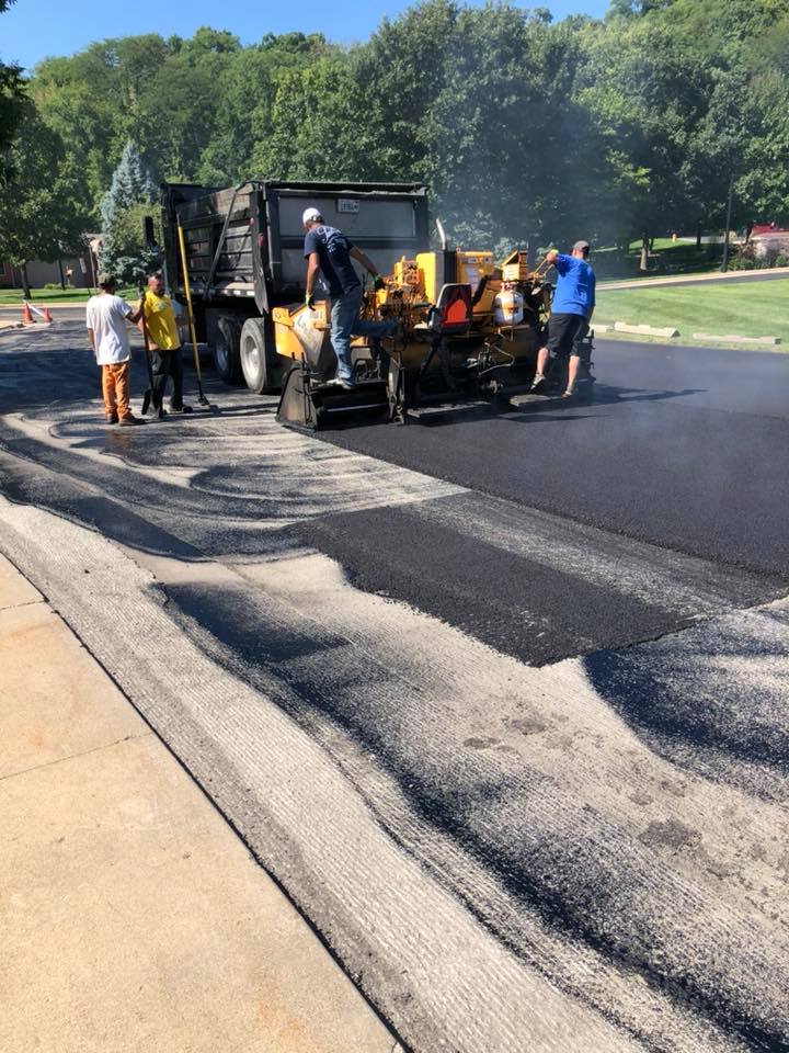 People Operating A Machine | East Peoria, IL | Pete George & Son Blacktop