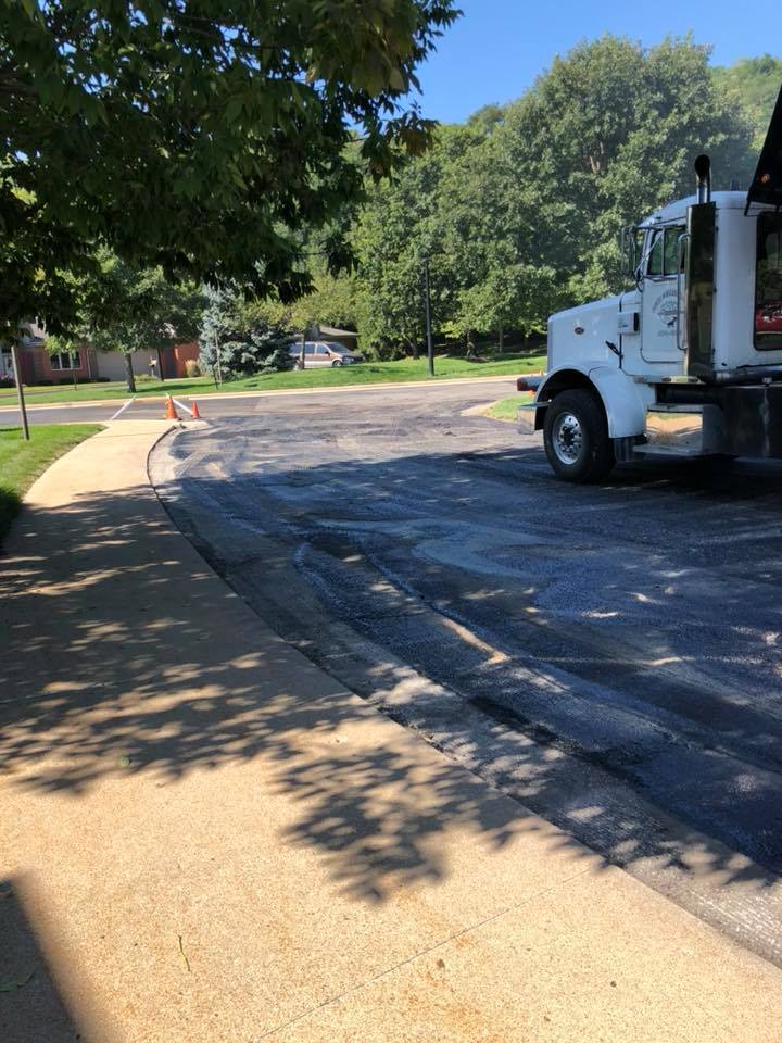 A Truck On An Asphalted Road | East Peoria, IL | Pete George & Son Blacktop