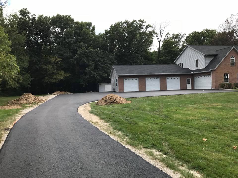 An Asphalt Road Beside A House | East Peoria, IL | Pete George & Son Blacktop