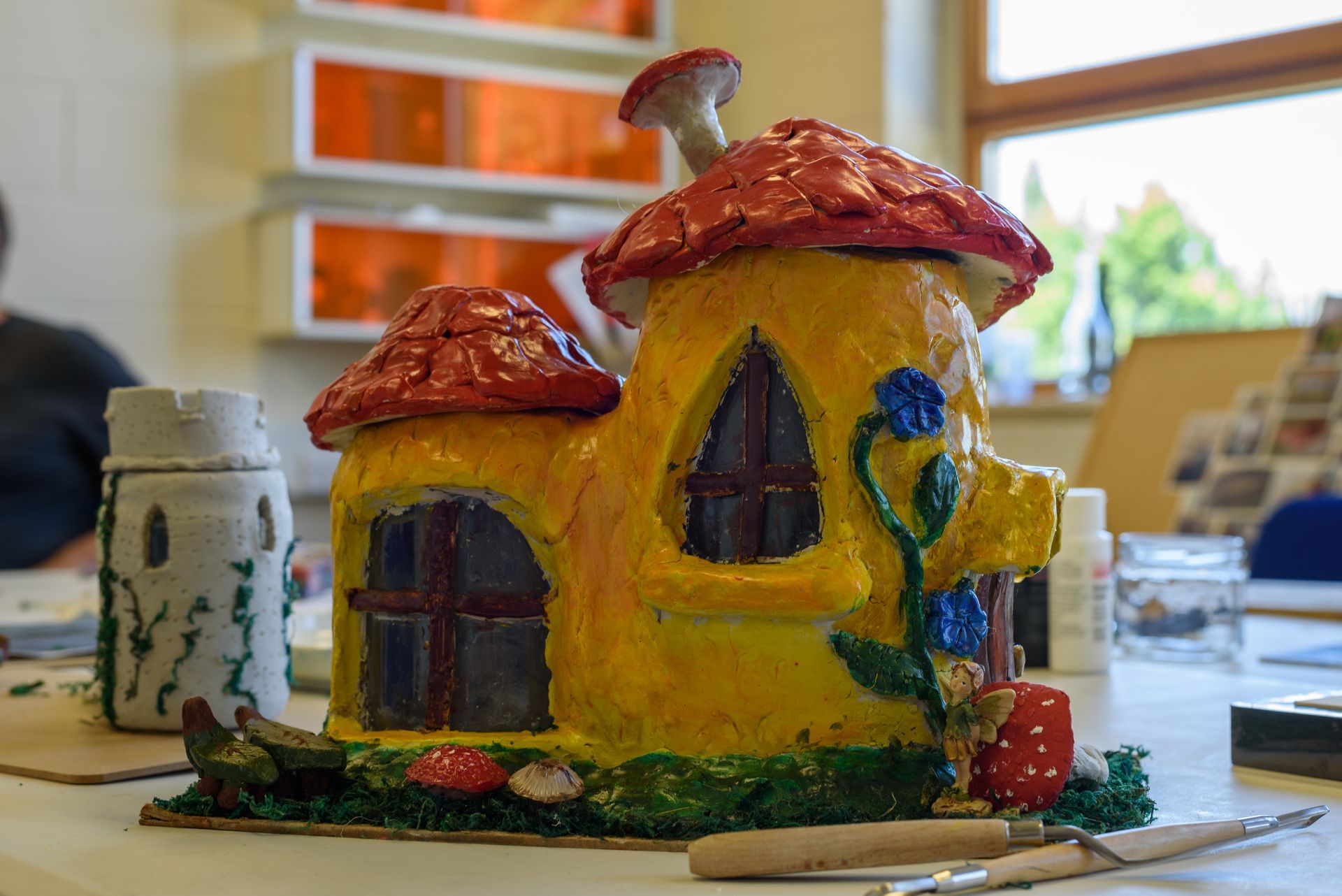 Ceramic model house from Kindred Minds course