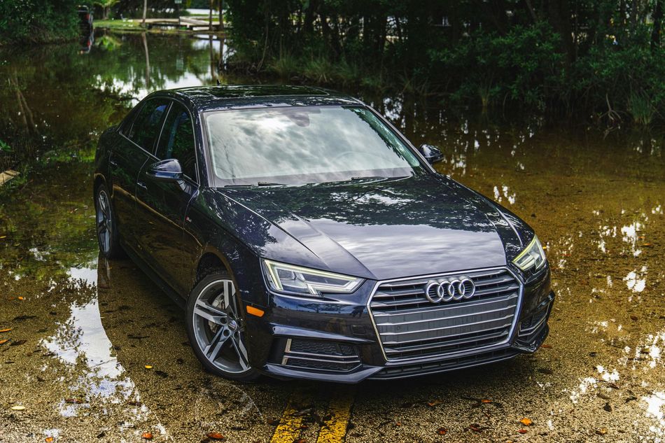A payless shoesource store with a blue awning