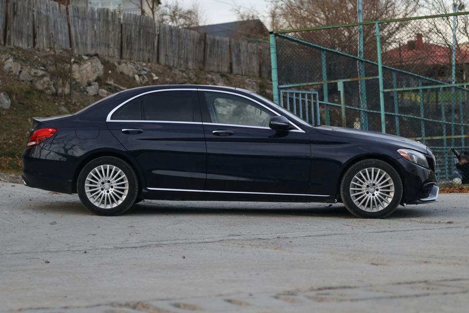 A payless shoesource store with a blue awning