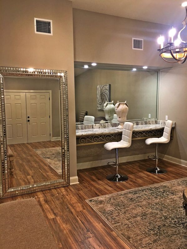 There is a large mirror in the middle of the room.