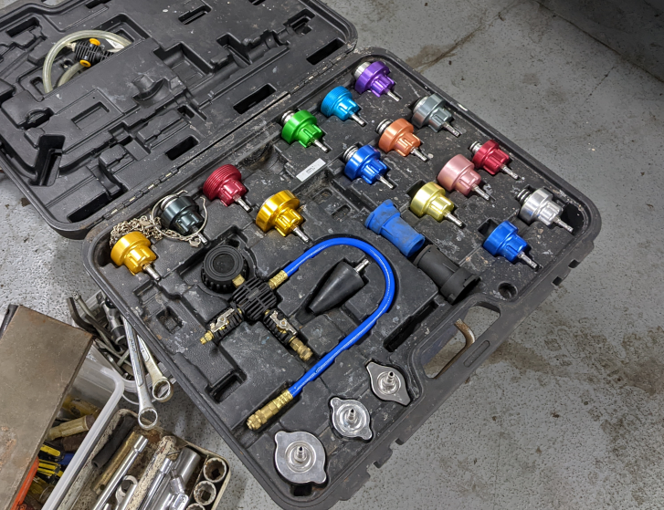 A toolbox with a lot of tools in it