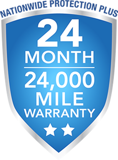 A blue shield that says 24 month 24,000 mile warranty