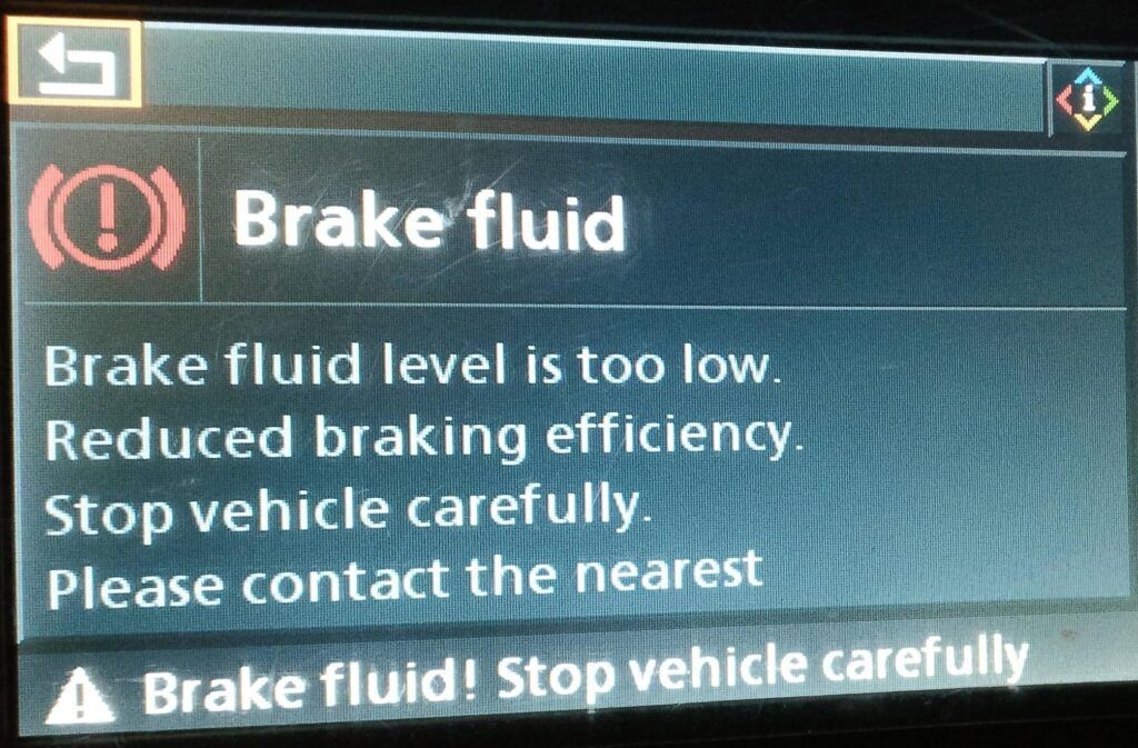 A screen that says brake fluid level is too low