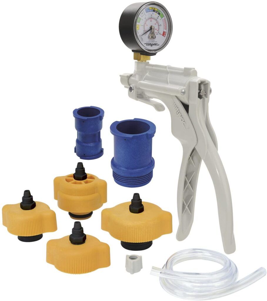 A vacuum pump with a gauge attached to it