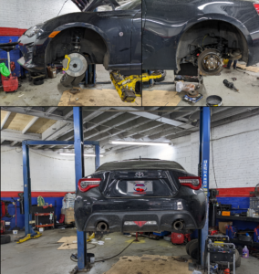 A collage of four pictures of a car on a lift in a garage